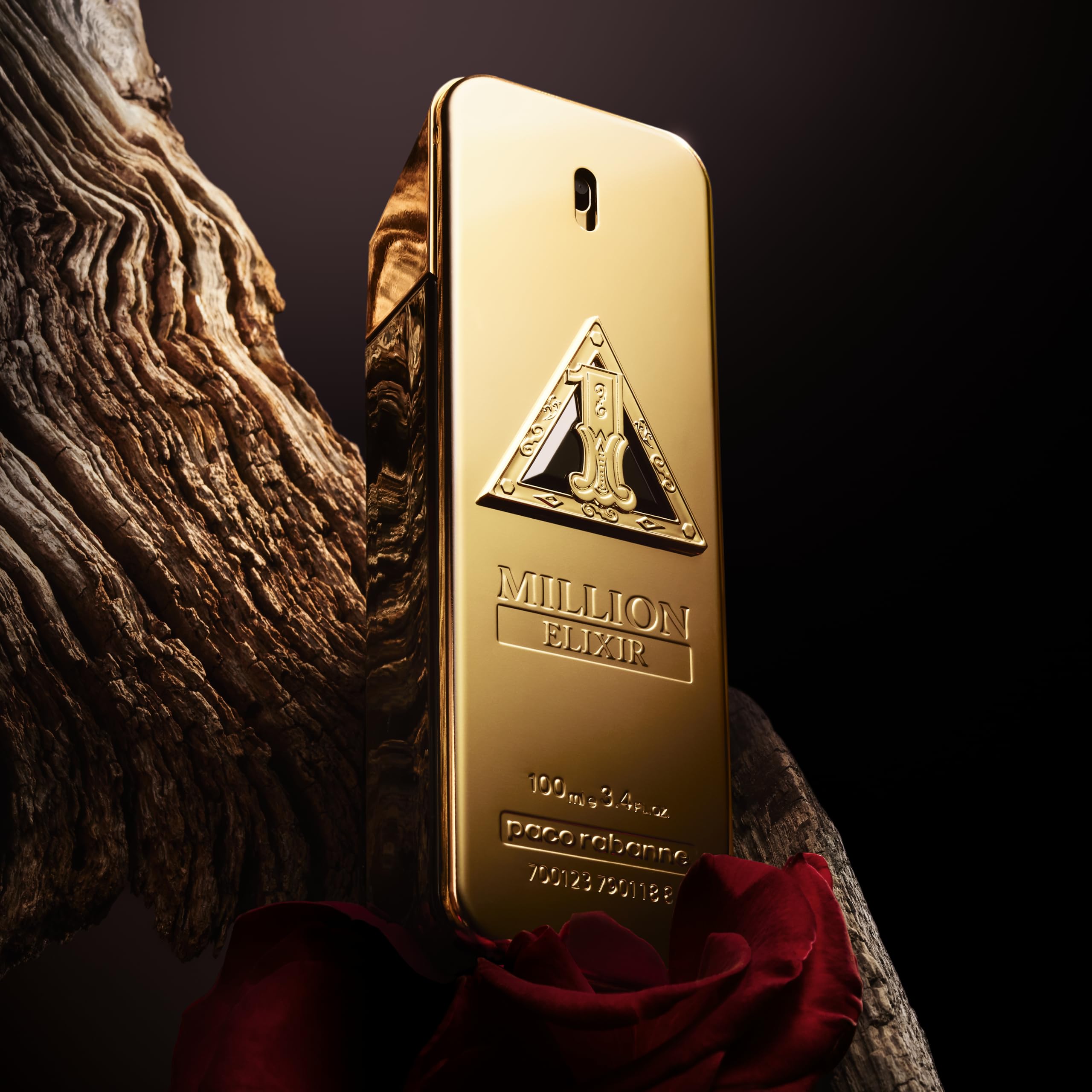 Paco Rabanne 1 Million Elixir spray mid-action highlights bold long-lasting scent.