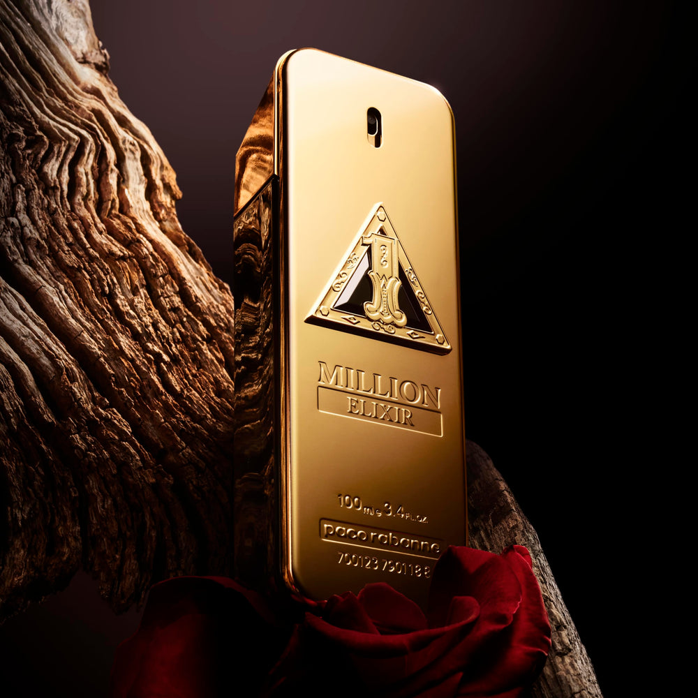 Paco Rabanne 1 Million Elixir spray mid-action highlights bold long-lasting scent.