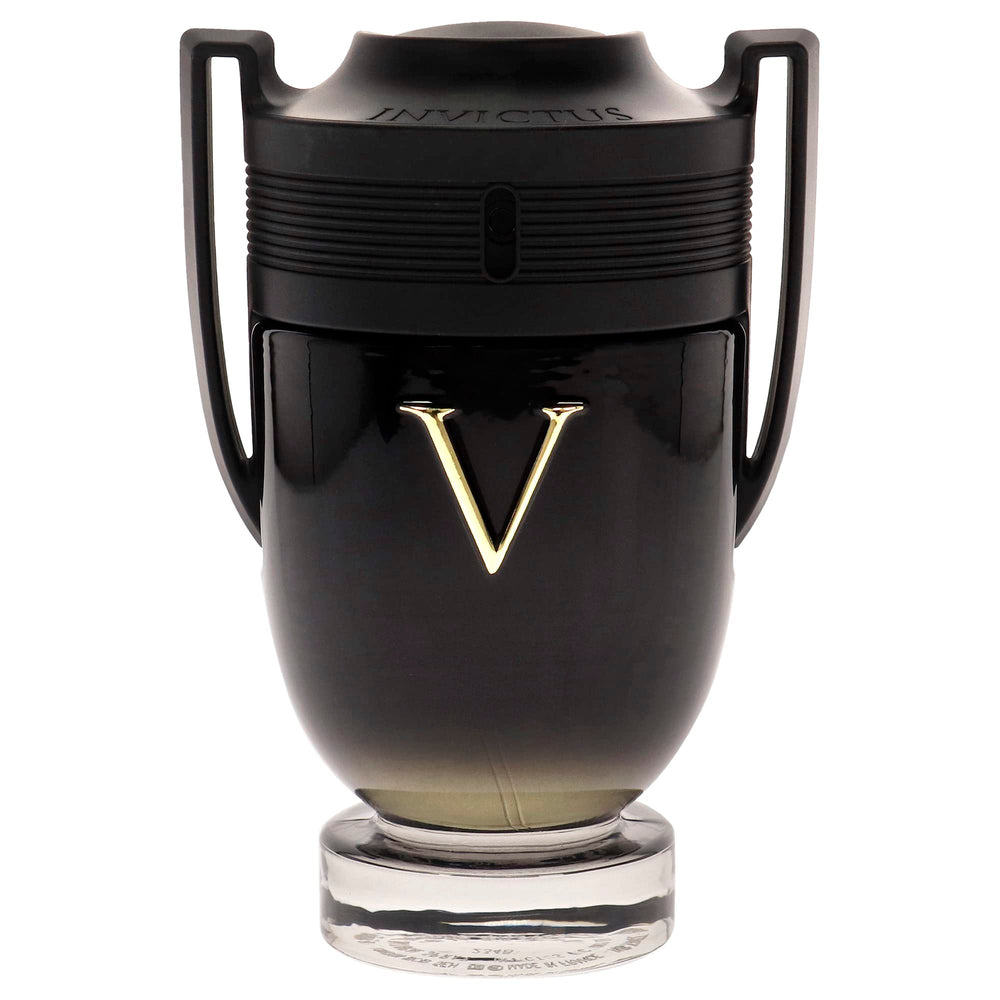Paco Rabanne Invictus Victory amber-tinge bottle with radiant glow.