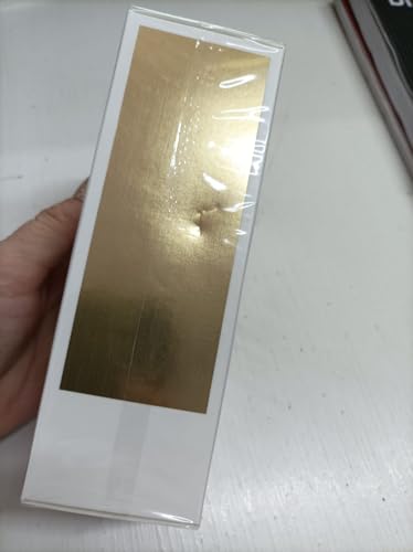 Paco Rabanne Million Gold Intense spray action demonstrates easy, precise application.