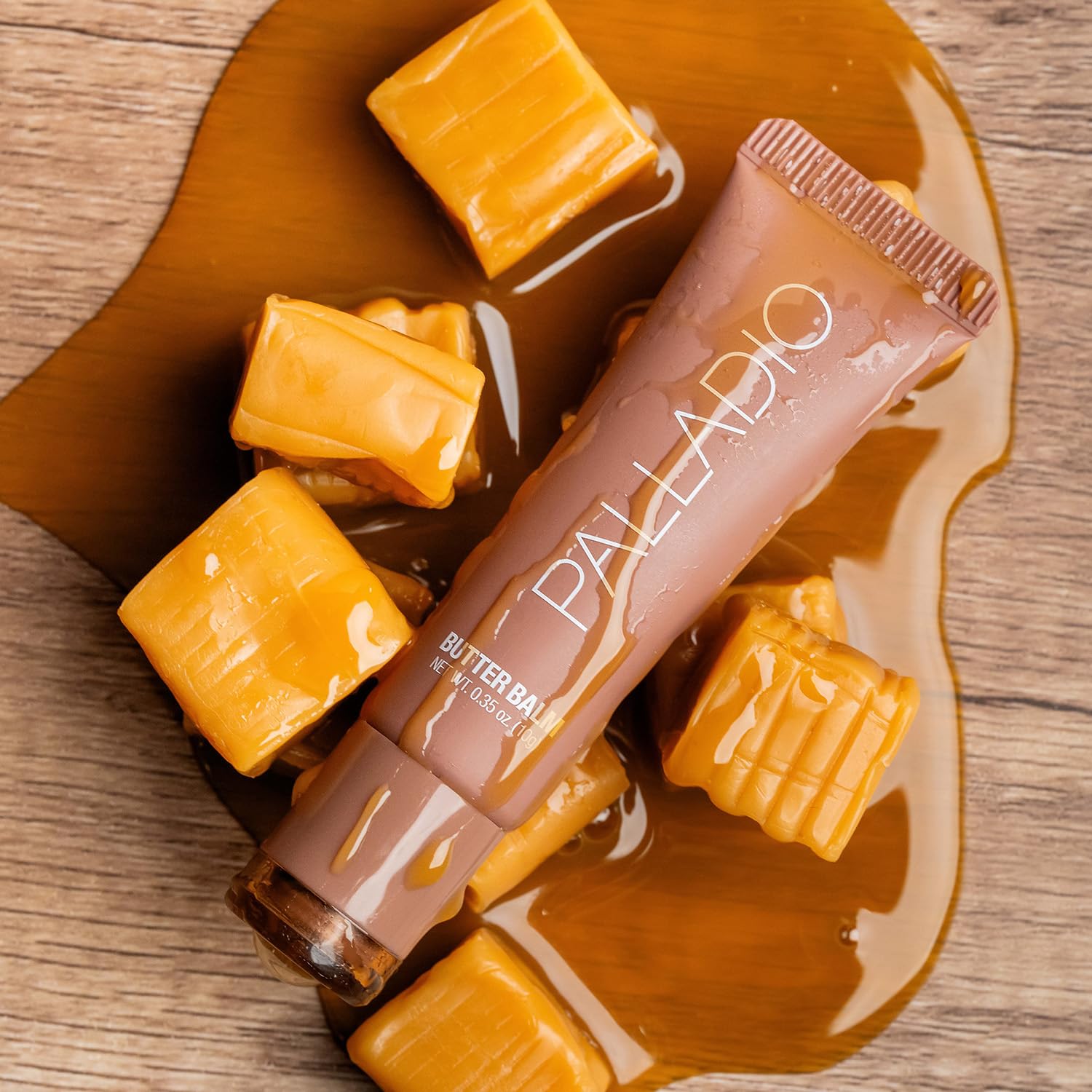 Palladio Butter Balm peptides vitamin E formula nourishes lips.