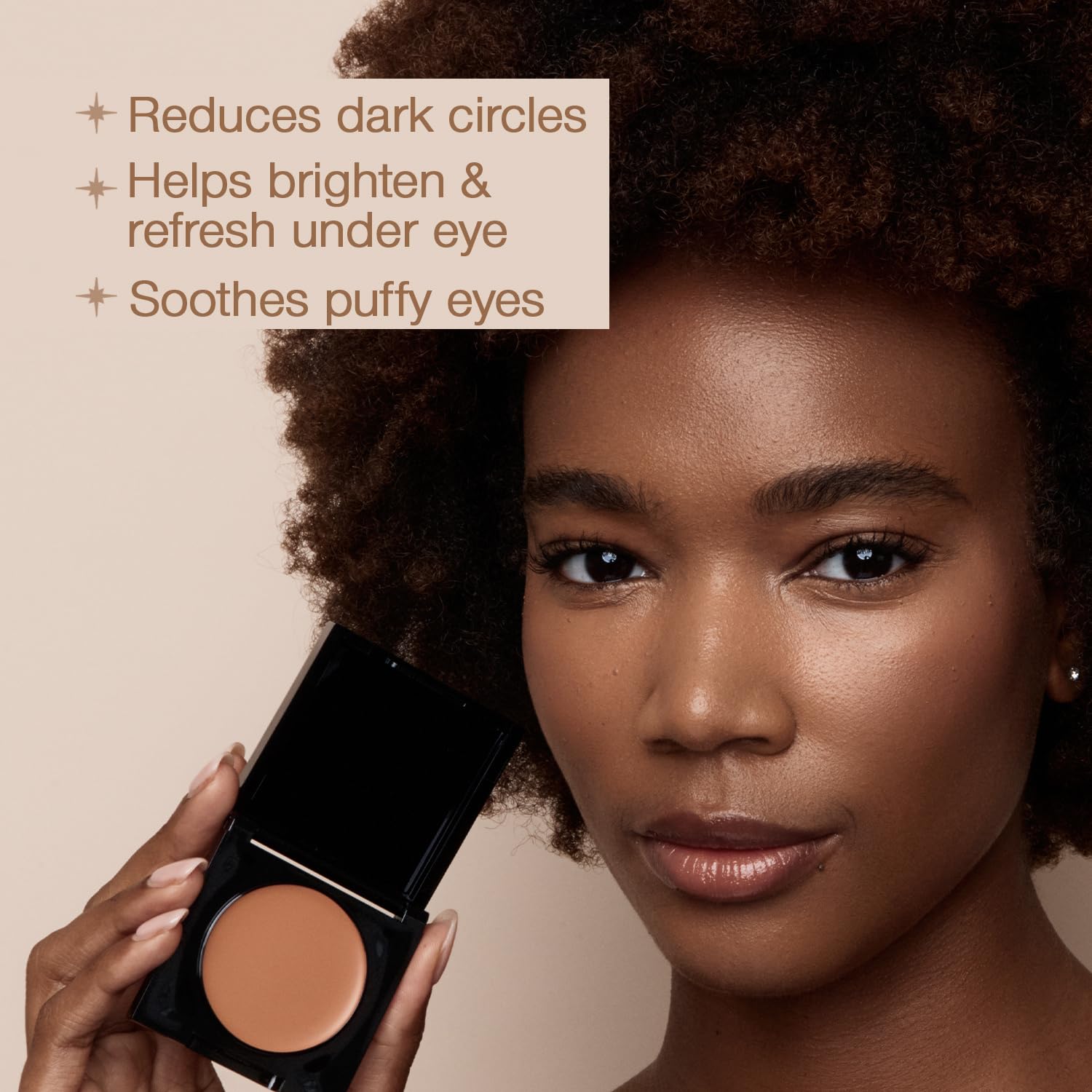 Palladio Under Eye Brightener being gently applied under eye for lifted brightness.