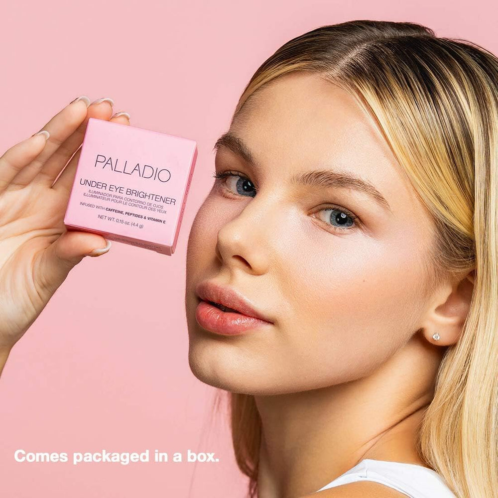 Palladio Under Eye Brightener tube closeup suggests easy application and portability.