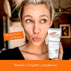 Palmer's Coconut Sugar Facial Scrub applied with circular motions for gentle buffing.