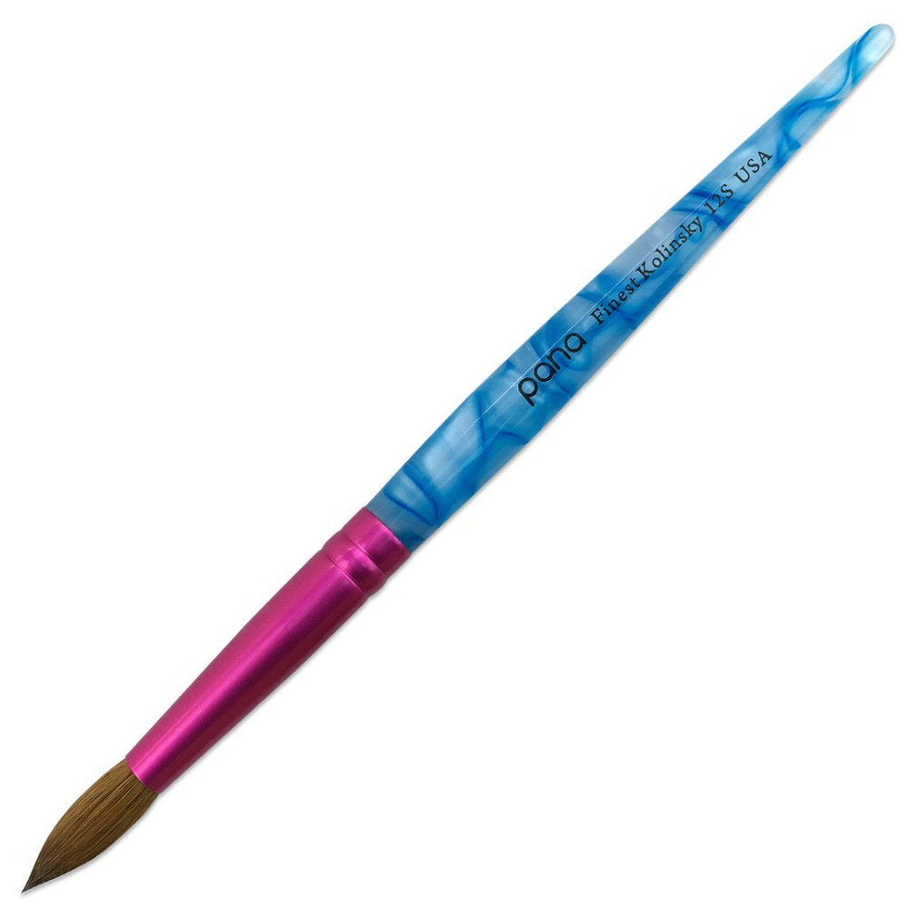 Pink ferrule keeps bristles secure during sculpting with PANA brush.