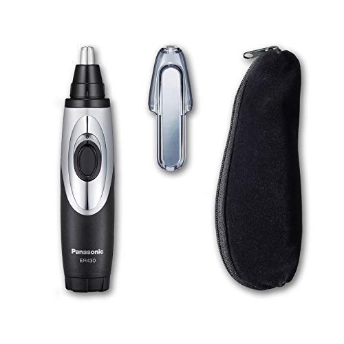 Panasonic ER430K vacuum system illustration, whisking away hair clippings.
