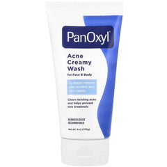 PanOxyl Creamy Acne Wash bottle pour showing gentle cleansing for clear pores.