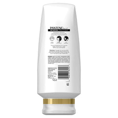Pantene Pro-V Curl Perfection conditioner bottle on shelf offers smoothing and moisture balance.