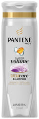 Pantene Pro-V Fine Hair Sheer Volume Shampoo bottle pour promotes voluminous, lifted hair.