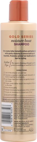 Pantene Pro-V Gold Series creamy lather on hand suggests softening moisture for hair.