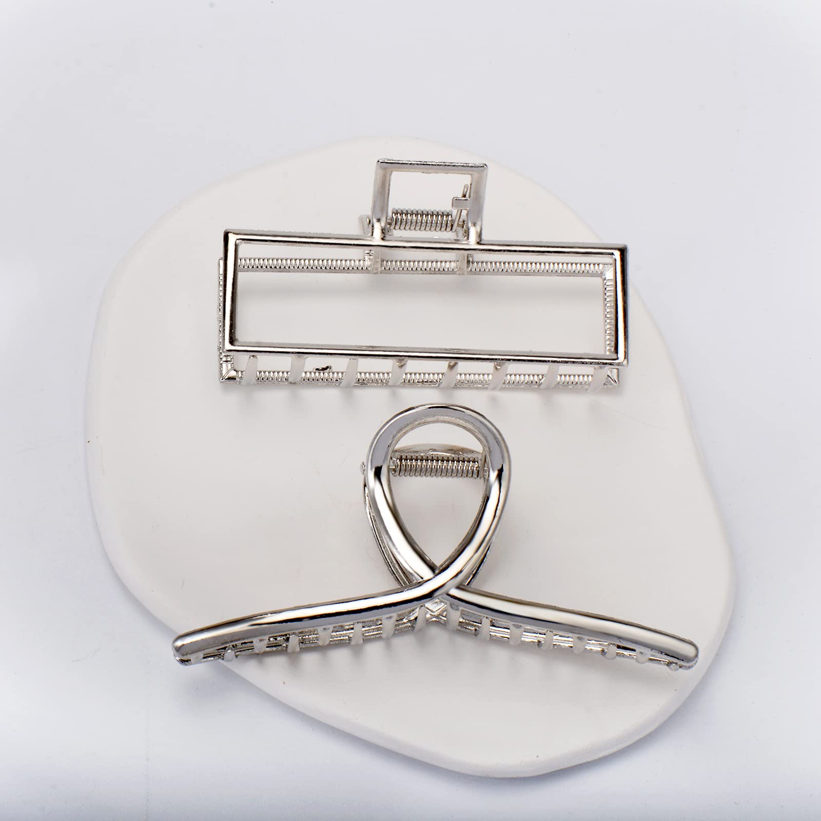 Parcce packaged-display ready-to-gift presentation with four silver clips.