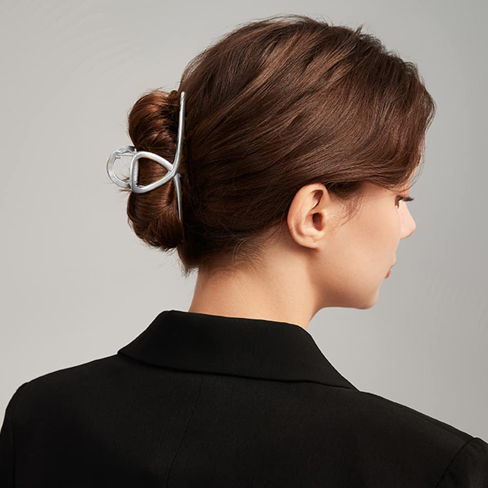 Parcce model-shot shows silver clip securing hair with everyday style.