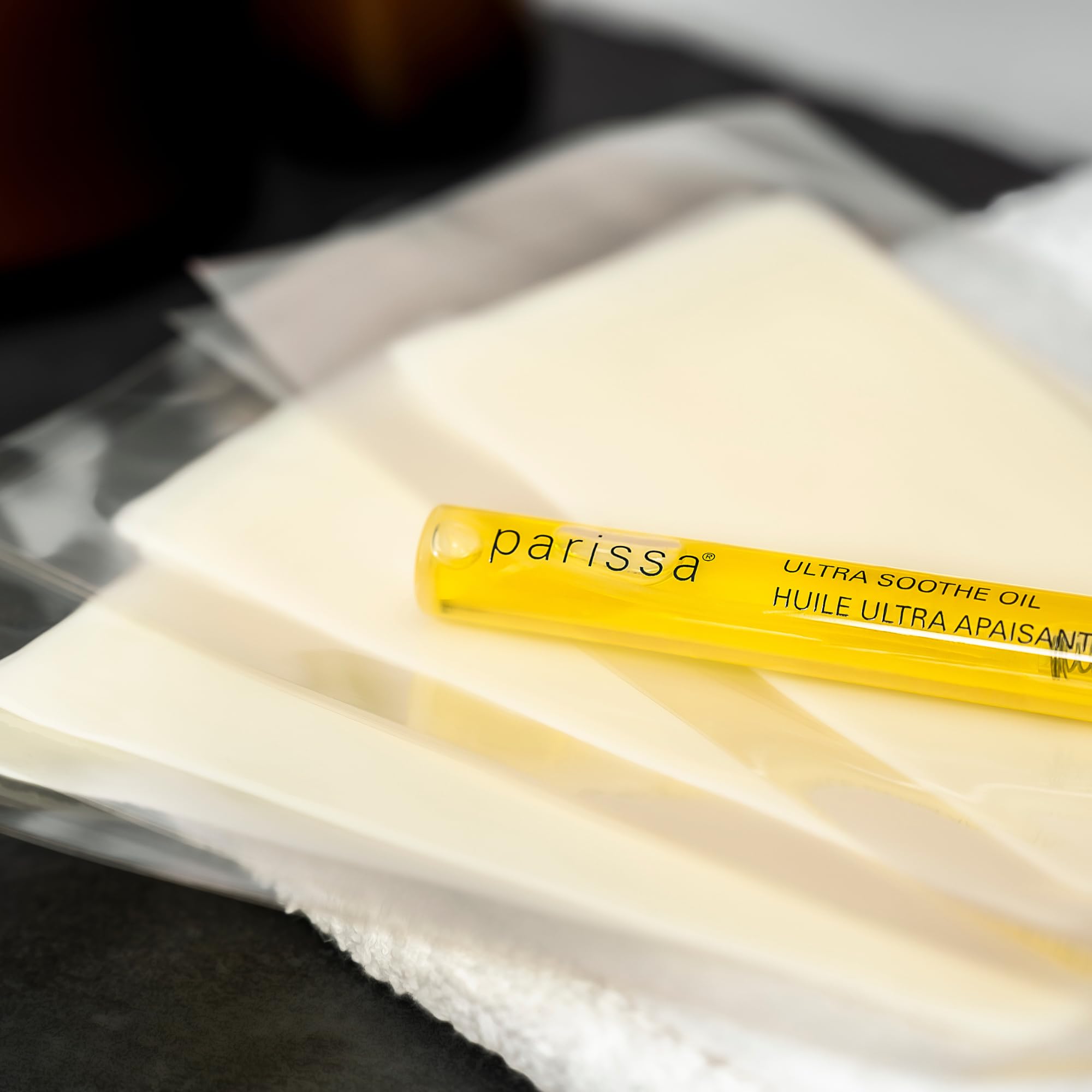 Parissa waxing demonstration on legs showing smooth results.