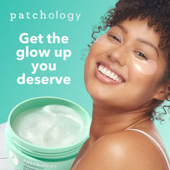 Patchology under-eye patches application closeup with caffeine for energizing effect.