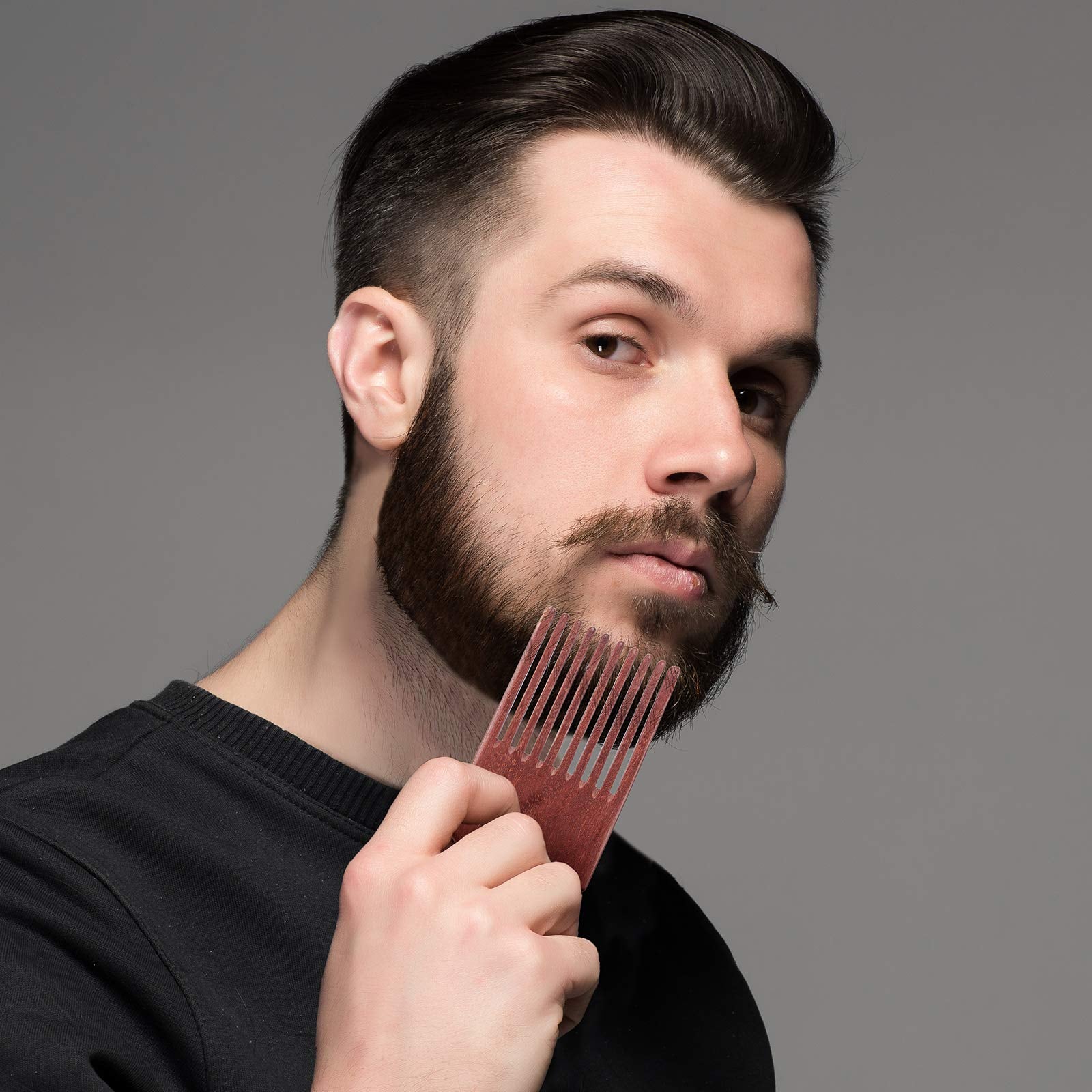 Patelai wooden comb in natural color demonstrating durable grooming tool