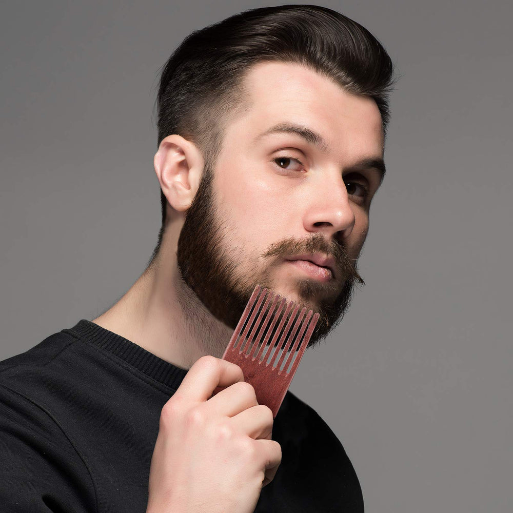Patelai wooden comb in natural color demonstrating durable grooming tool
