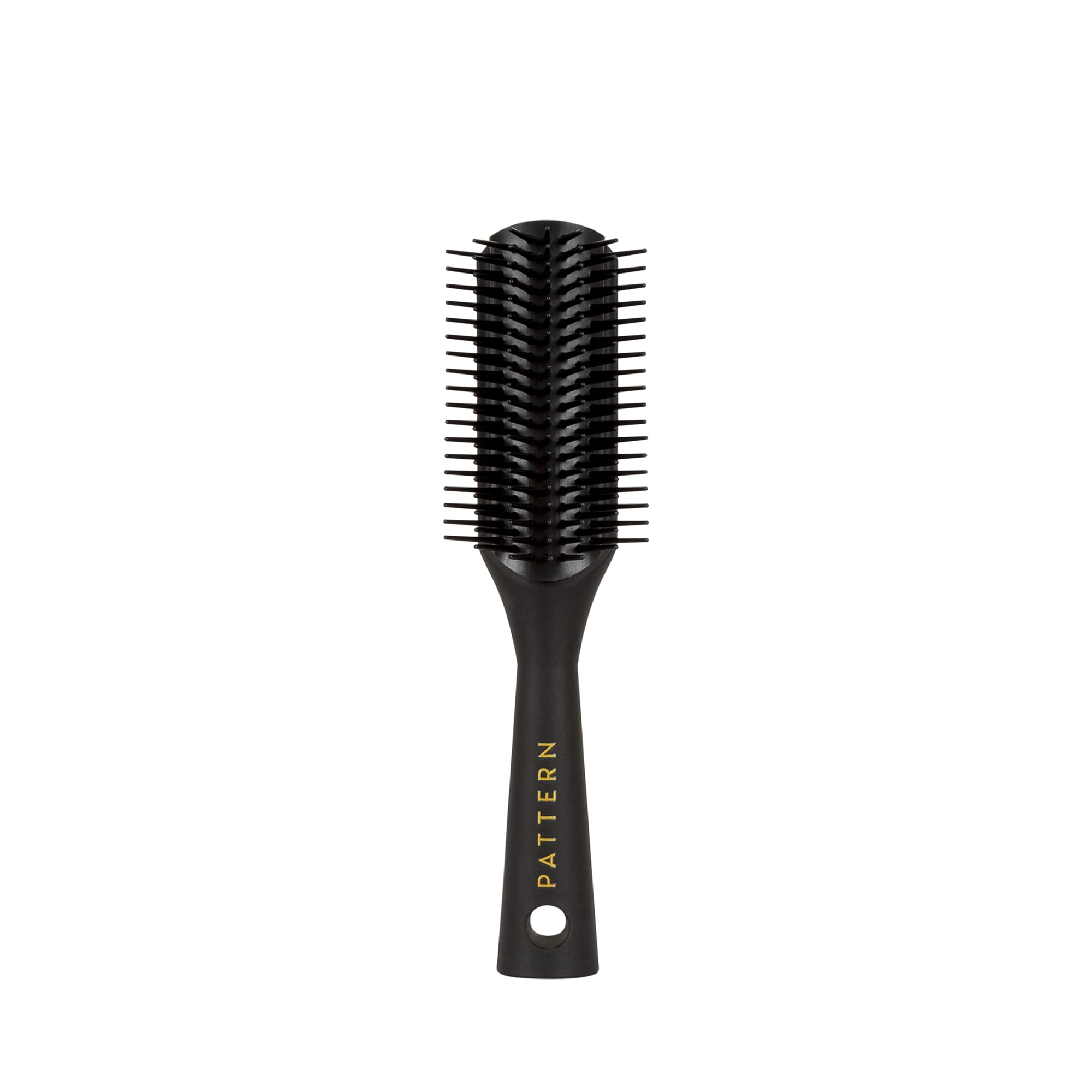 PATTERN Beauty Mini Shower Brush bristles closeup aiding gentle detangling of curls.