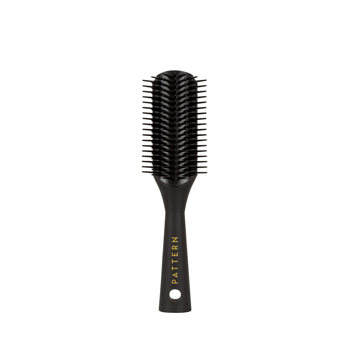 PATTERN Beauty Mini Shower Brush bristles closeup aiding gentle detangling of curls.