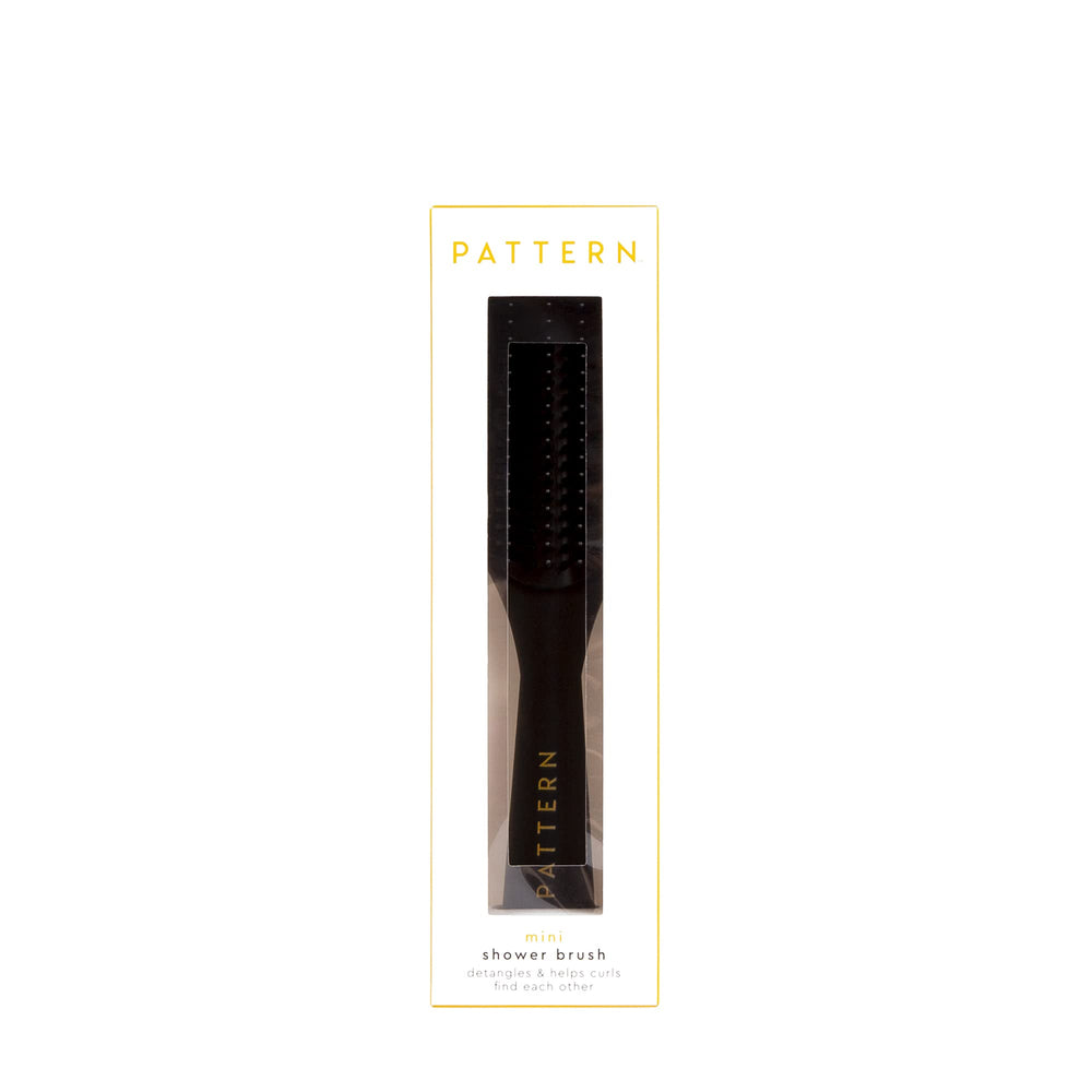 PATTERN Beauty Mini Shower Brush curl-definition focus improves clumping and detangling.