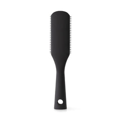 PATTERN Beauty Shower Brush handle grip highlights ergonomic, comfortable control during shower styling.