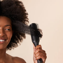 PATTERN Beauty Shower Brush waterproof bristles ensure smooth glide through damp hair.