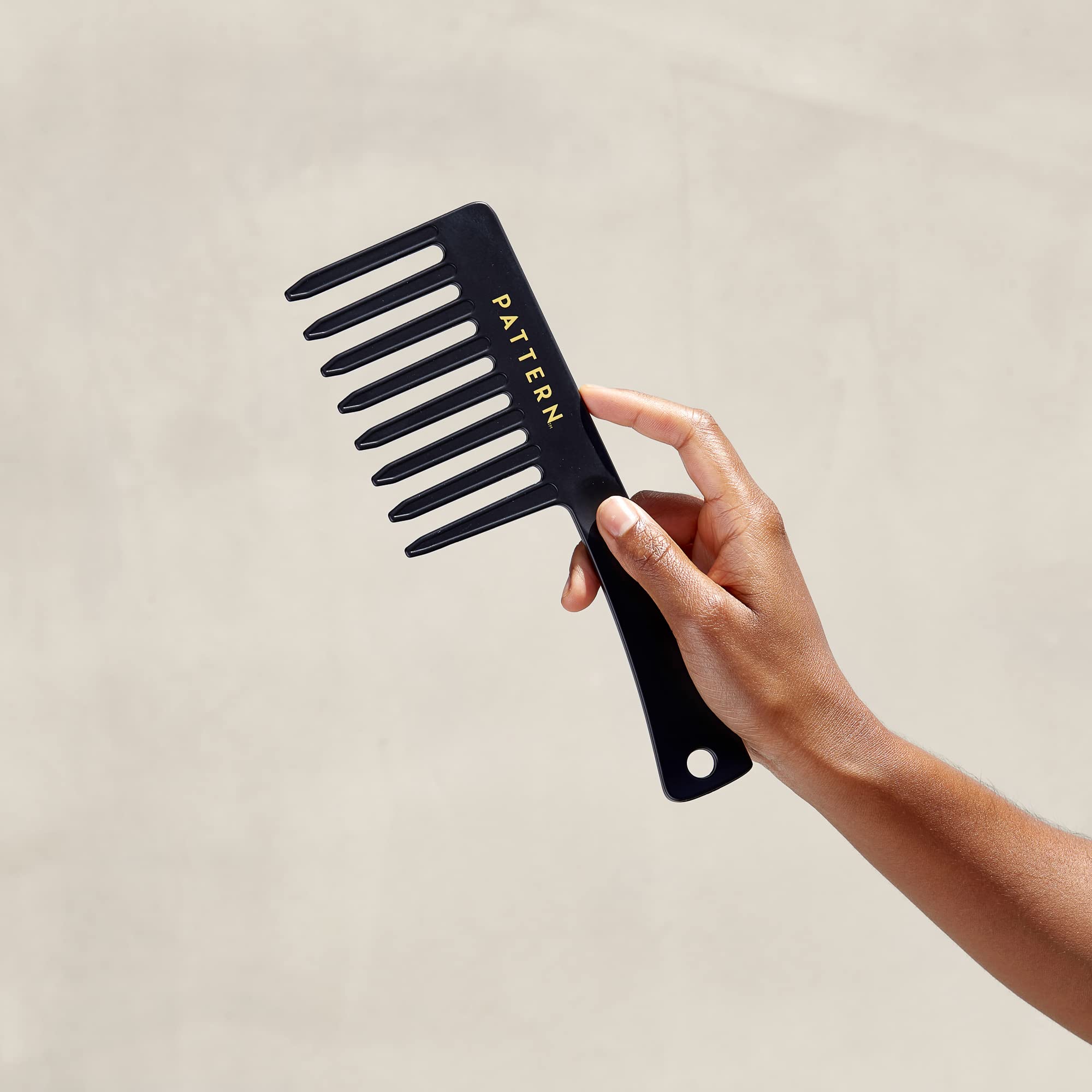 PATTERN Beauty wide tooth comb on dry hair helps add volume and separation