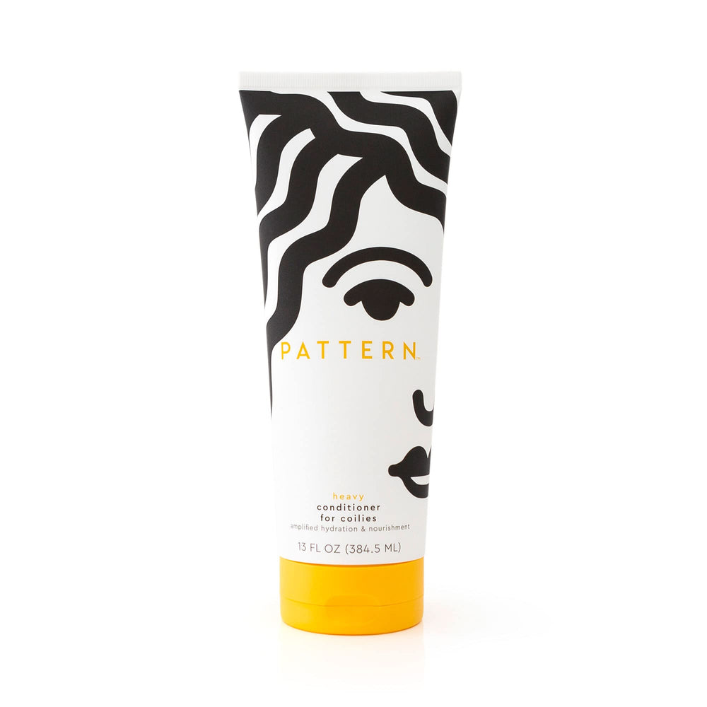 Pattern Heavy Conditioner bottle on shelf highlights rich hydration for curly hair.