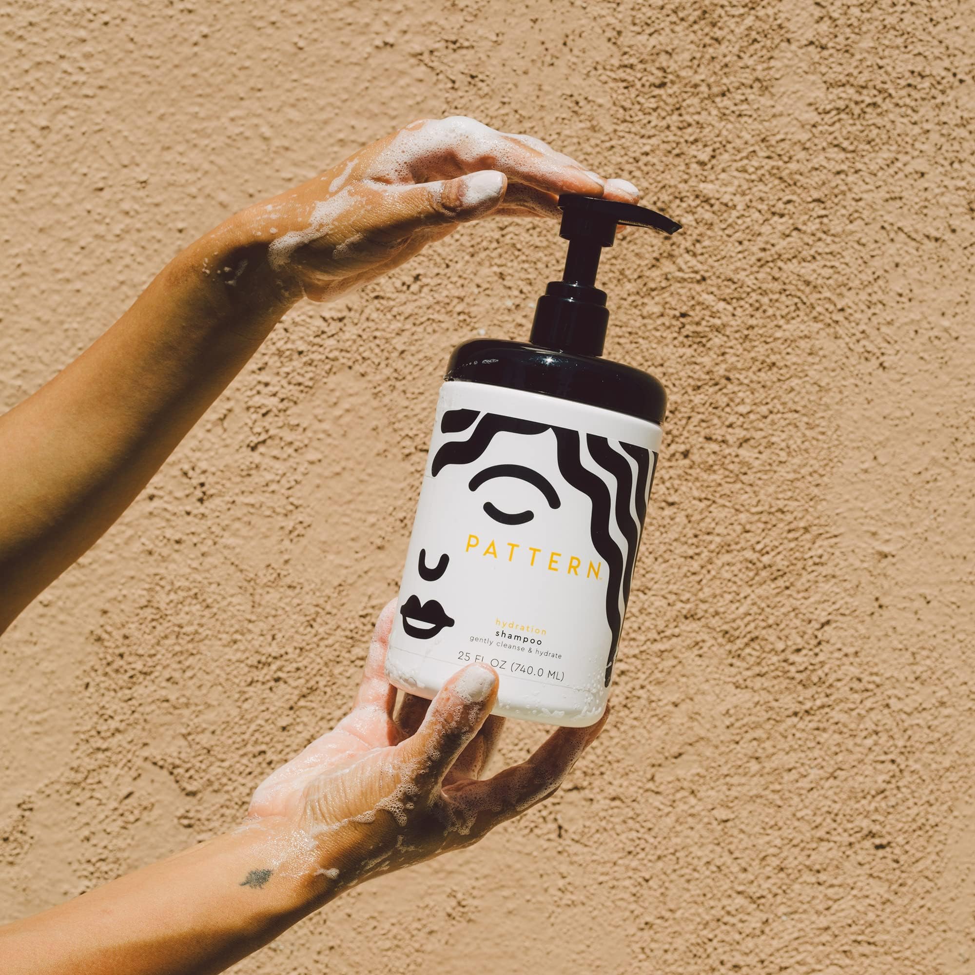 PATTERN Hydration Shampoo creamy-lather closeup demonstrates luxurious cleansing