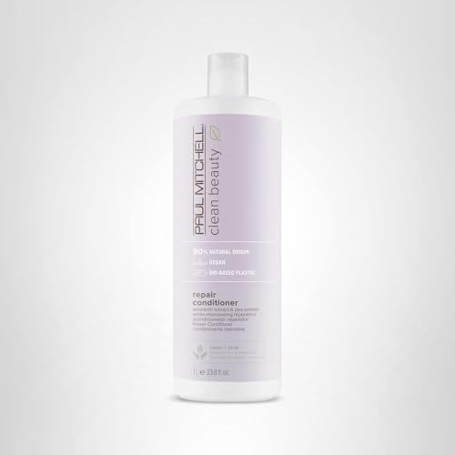 Paul Mitchell Repair Conditioner bottle with fragrant delicate musk for a gentle experience.