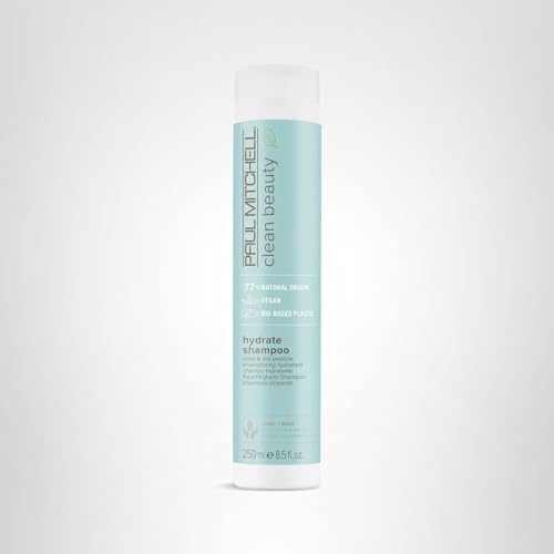 Paul Mitchell Clean Beauty Hydrate Shampoo on bathroom shelf suggesting healthier-looking hair