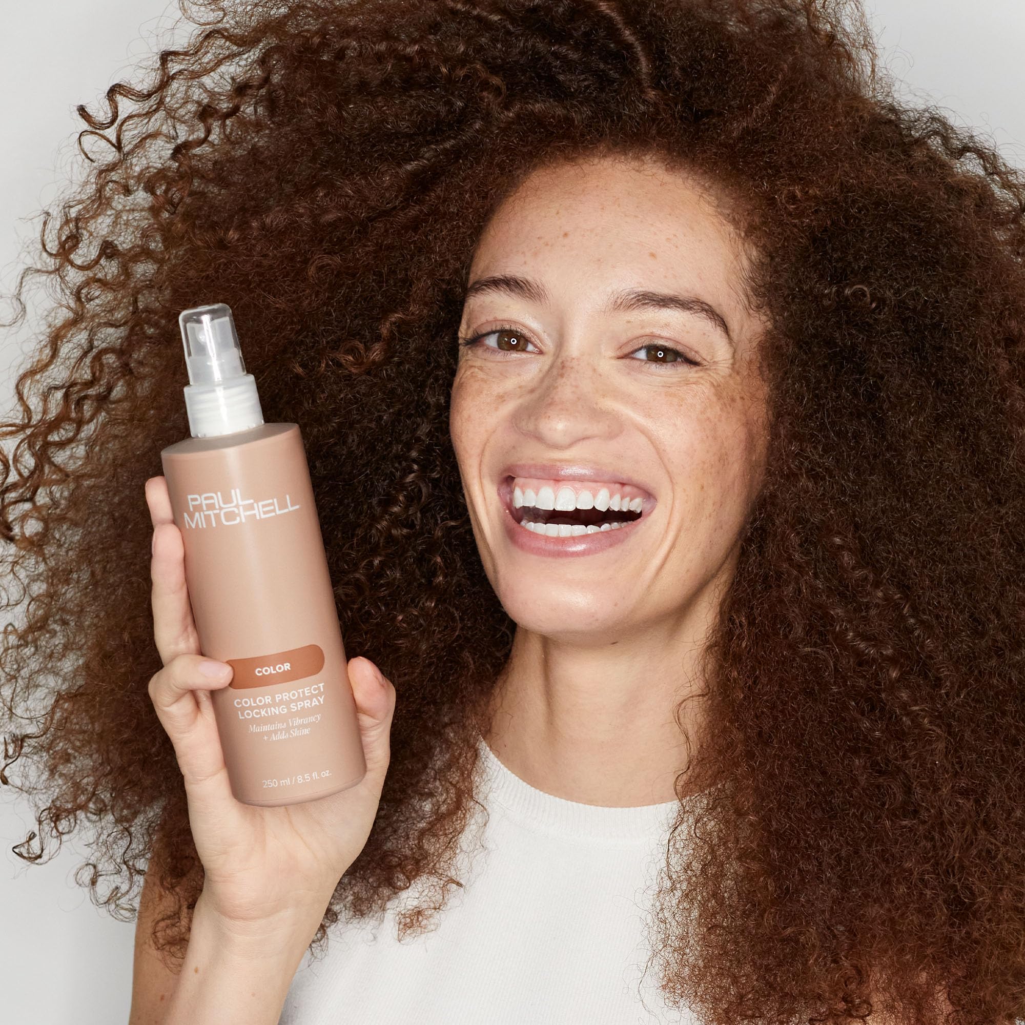 Paul Mitchell Color Protect Locking Spray fragrance notes orange, apple, bergamot.