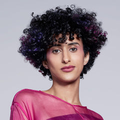 Paul Mitchell ESP Elastic Shaping Paste hands apply shows quick definition and texture in use.