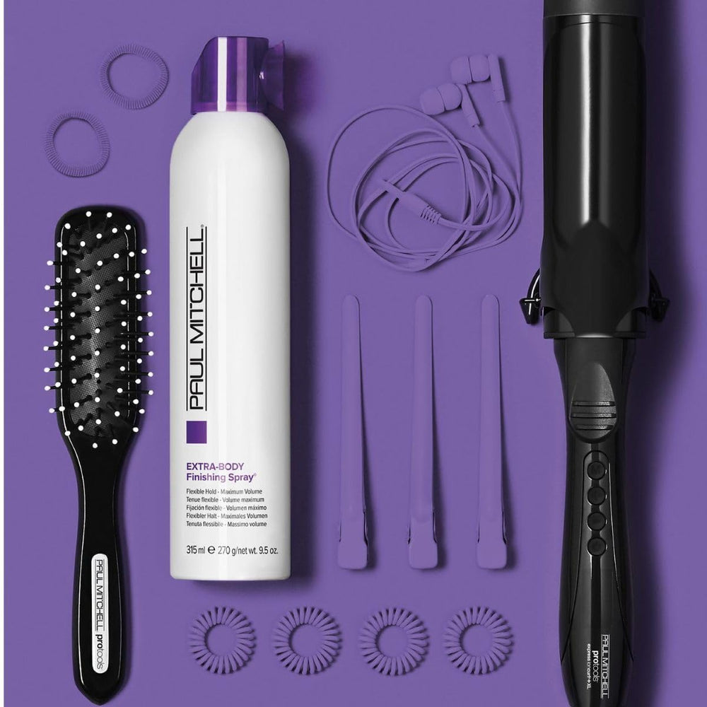 Paul Mitchell Extra-Body Finishing Spray on hair with crisp apple fragrance.