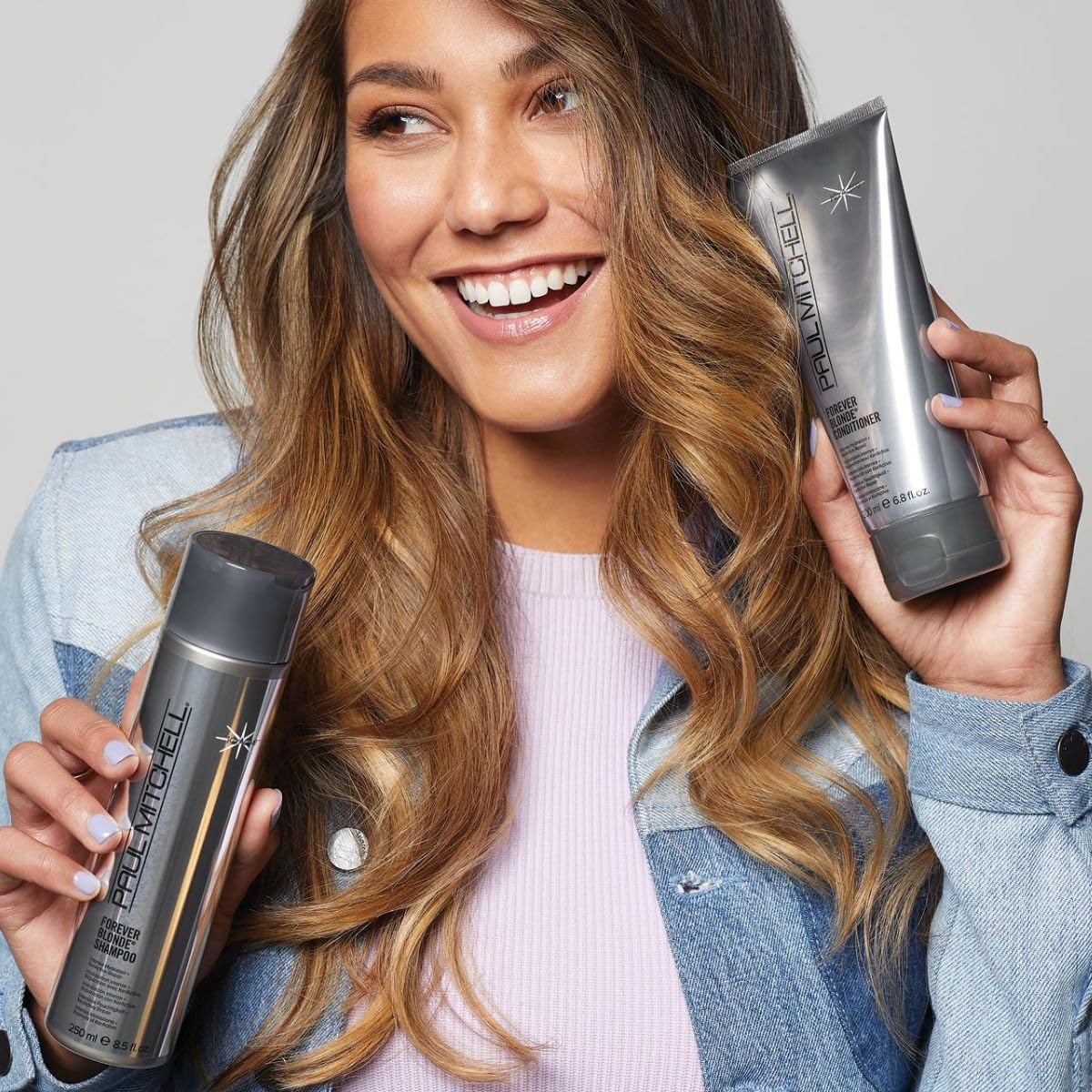 Paul Mitchell Forever Blonde Conditioner on blonde hair demonstrating detangling and shine