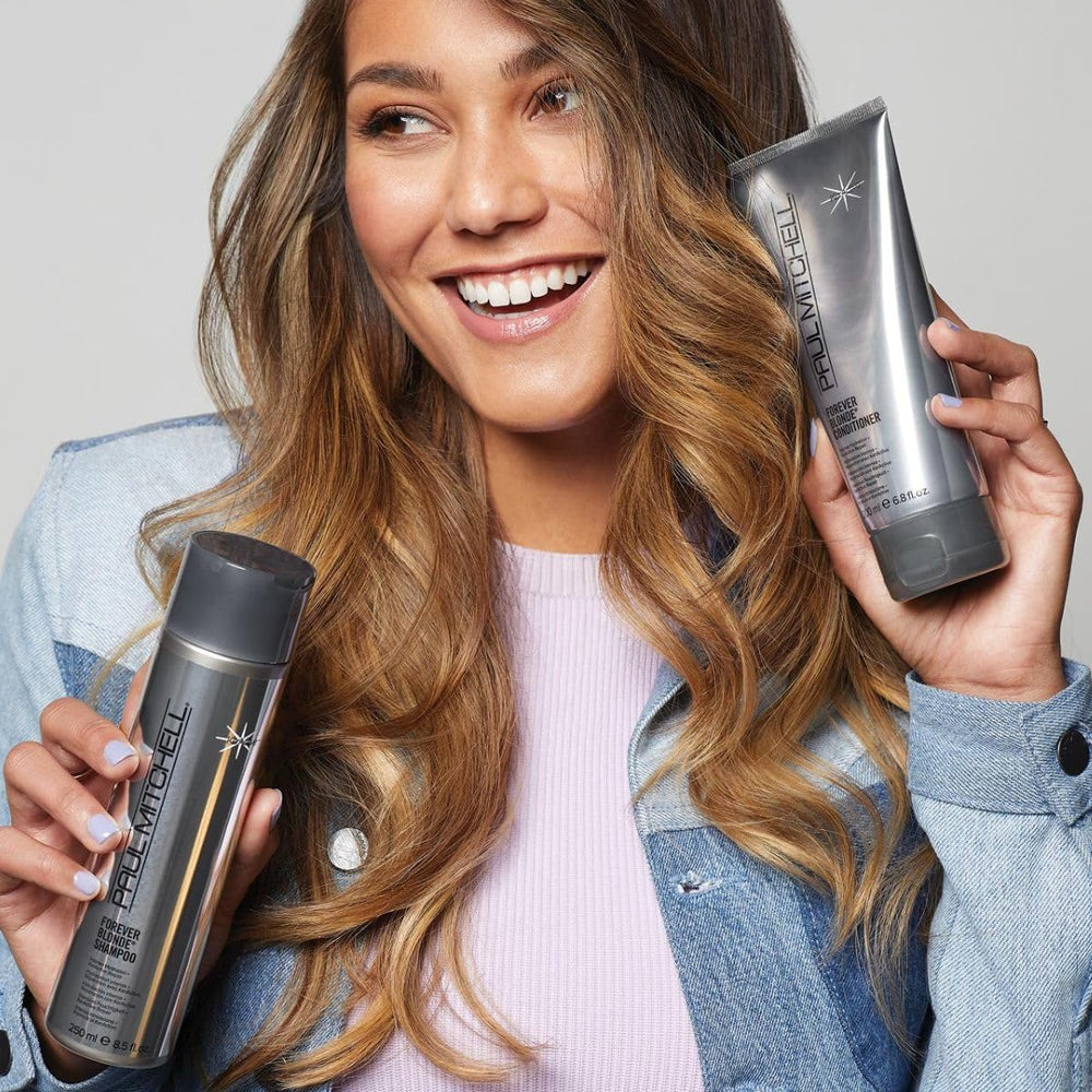 Paul Mitchell Forever Blonde Conditioner on blonde hair demonstrating detangling and shine