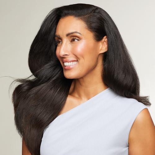Paul Mitchell Freeze and Shine hairspray mist demonstrates quick-set hold for coarse hair.