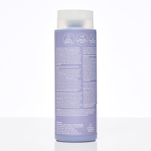 Paul Mitchell Platinum Blonde Violet Shampoo lifestyle shot at sink suggests salon-worthy color care