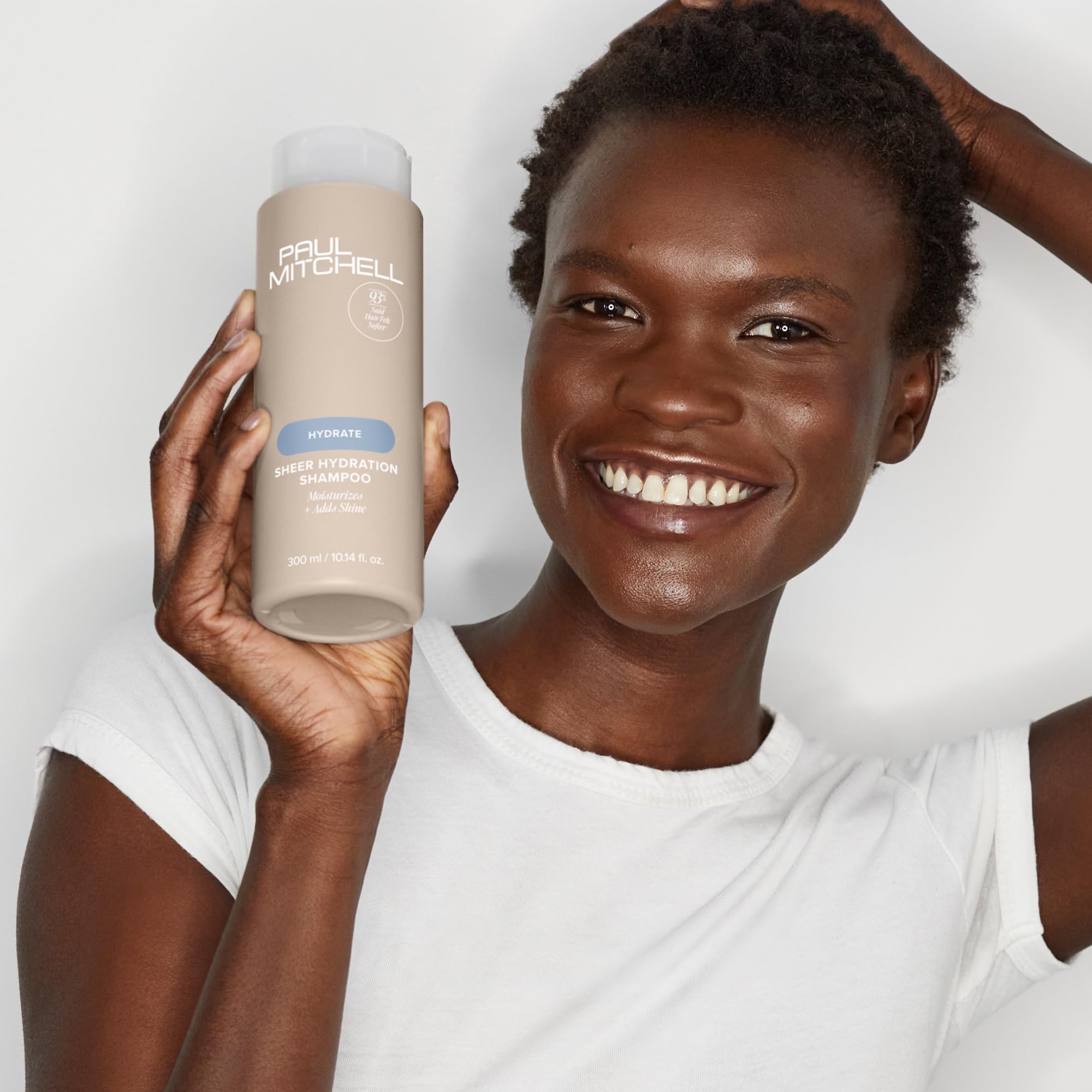 Paul Mitchell Sheer Hydration Shampoo pour bottle shows easy, smooth dispensing
