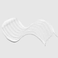 Paul Mitchell Super Strong Conditioner close-up texture hints at smoothing action.