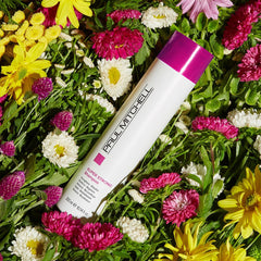 Paul Mitchell Super Strong Shampoo foamy-lather demonstrates rich cleansing for damaged strands.