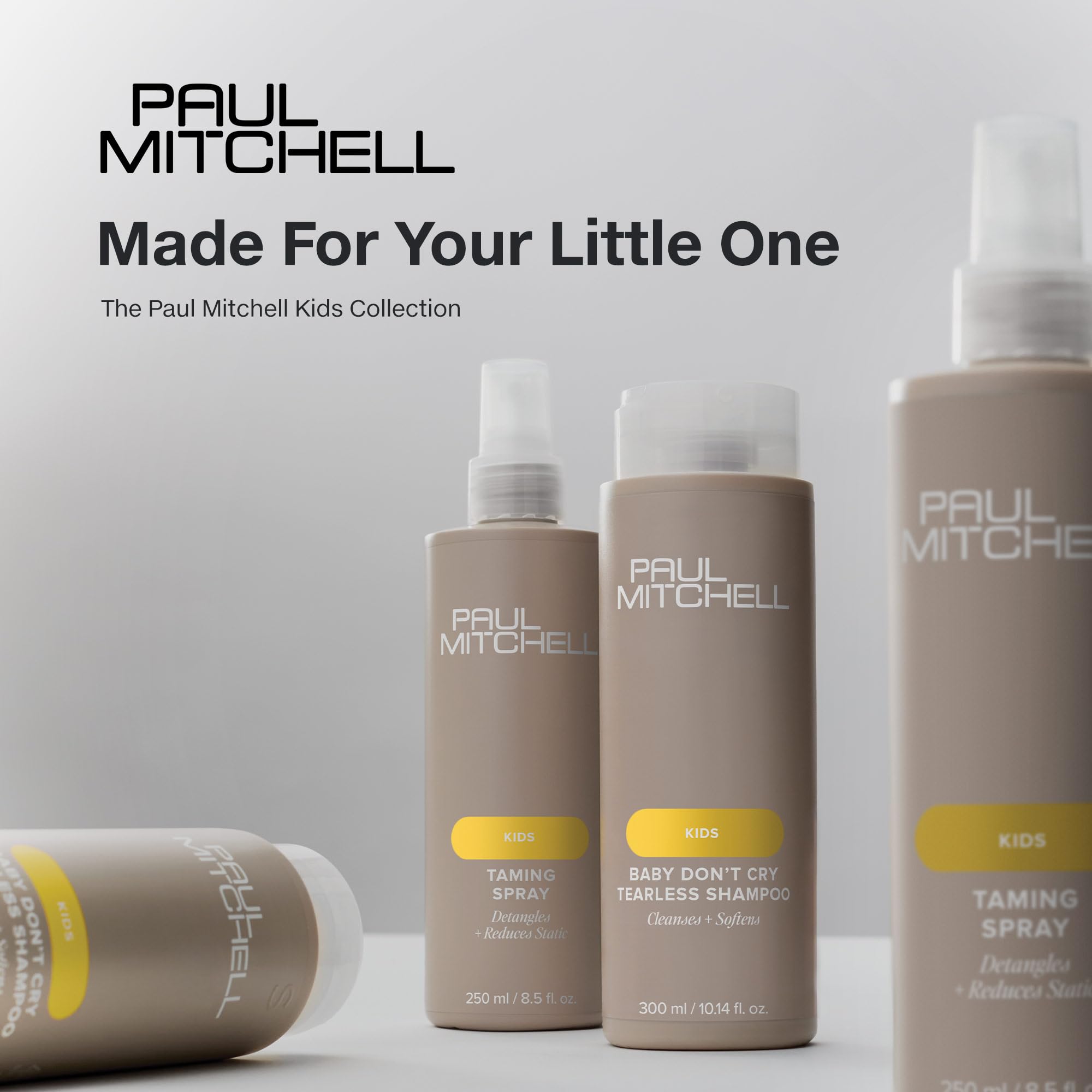 Paul Mitchell Taming Spray bottle close-up highlighting design