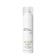 Paul Mitchell Texturizing Spray bottle closeup for defined texture and extended style.