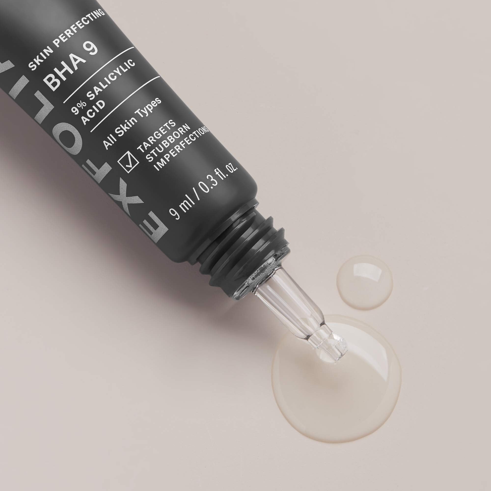 Paula's Choice BHA 9 spot-treatment being dabbed on a blemish for targeted exfoliation