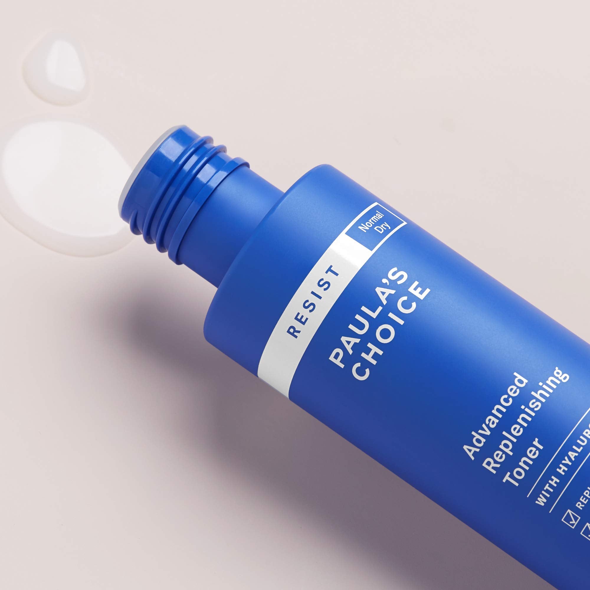 Paula's Choice Resist toner swiped onto skin as part of a routine.