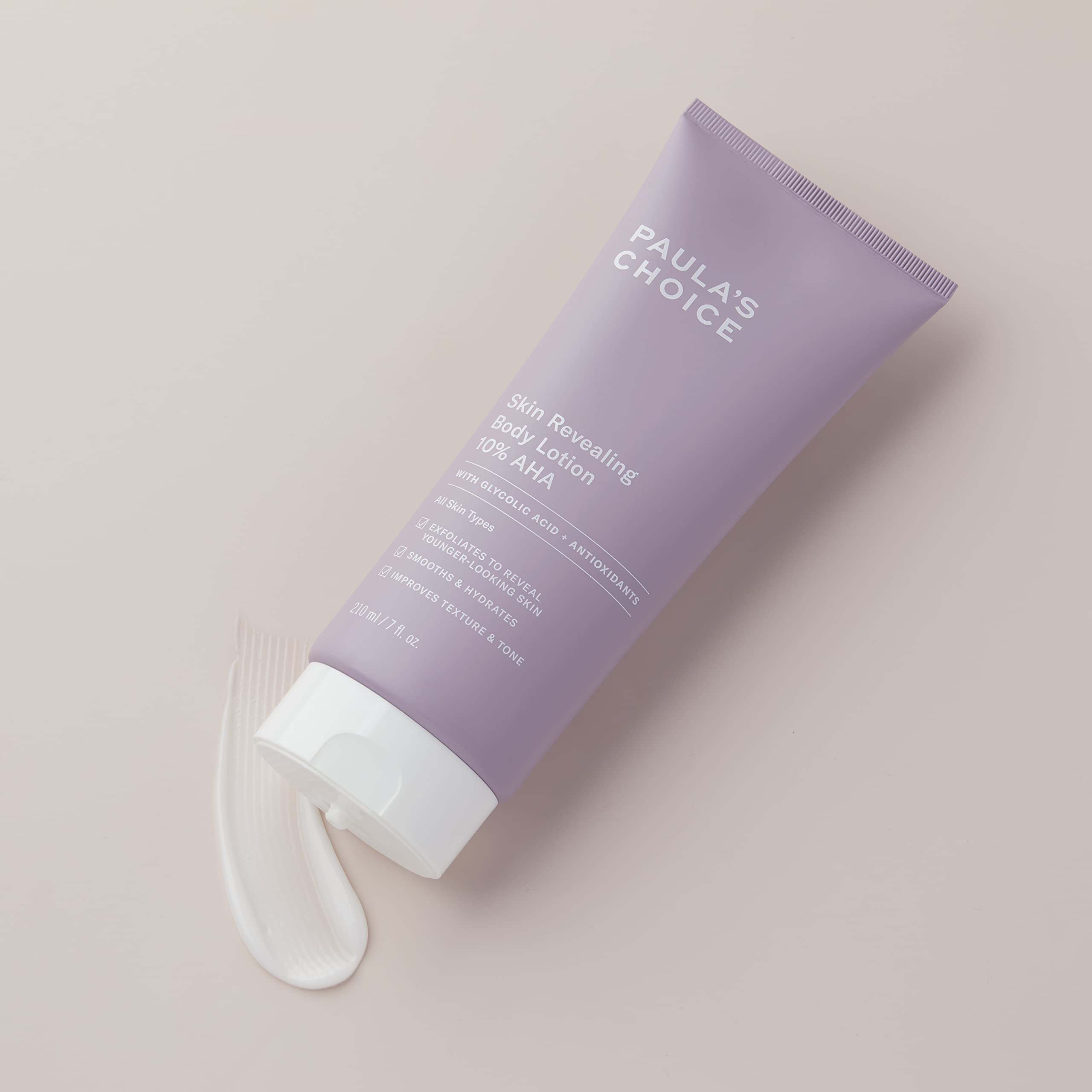 Paula's Choice Skin Revealing Body Lotion applied to arm for smoother, even-looking skin