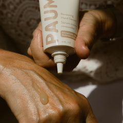 PAUME Renewing Hand Serum 2oz packaging highlights convenient size for travel.