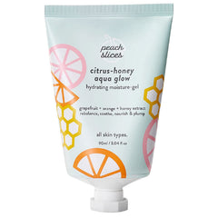 Peach Slices Citrus-Honey Aqua Glow bottle shows lightweight hydration for daily use