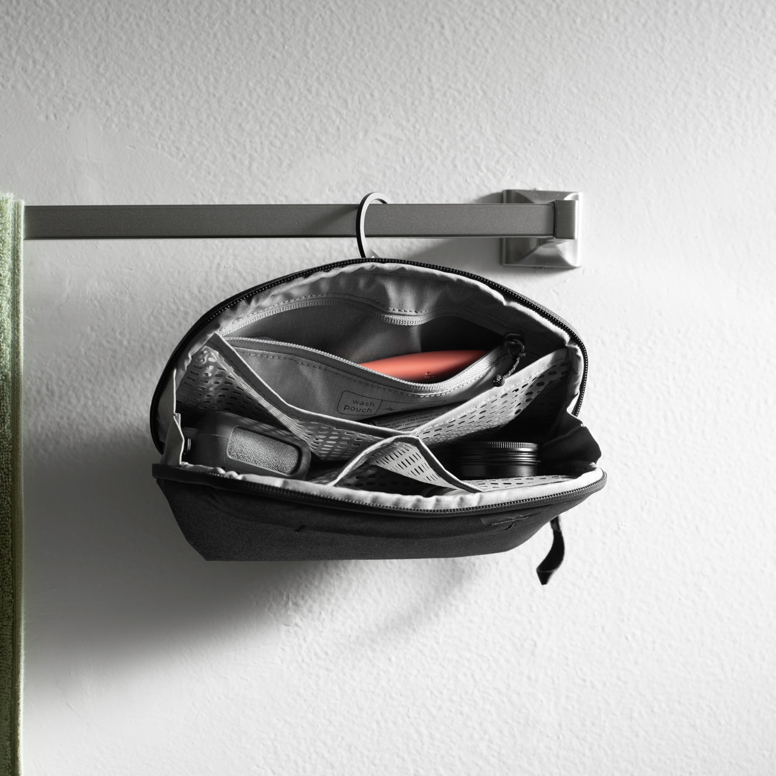 Peak Design Small Wash Pouch standing upright for easy counter access