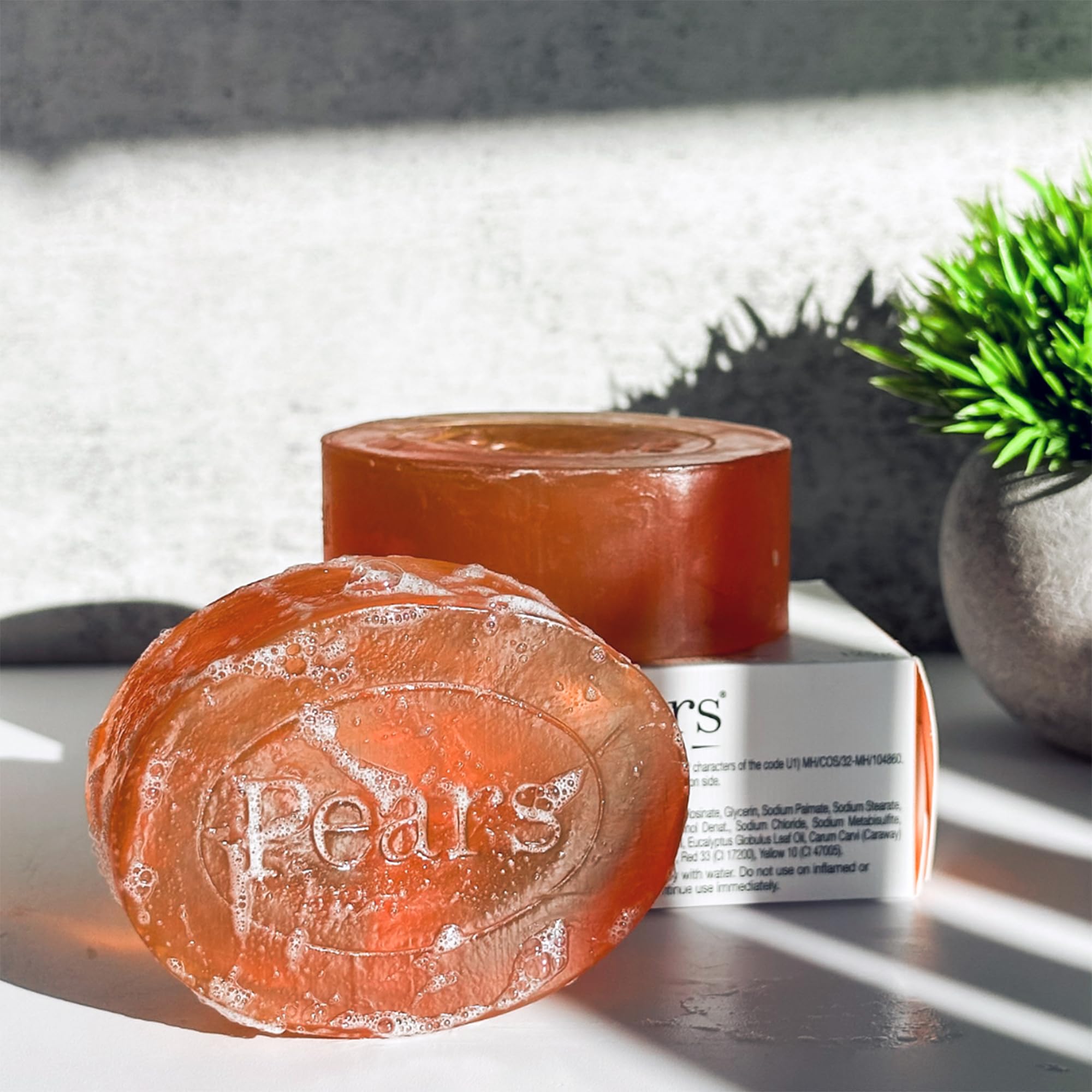 Pears soap 200-year filtering process closeup communicates purity.