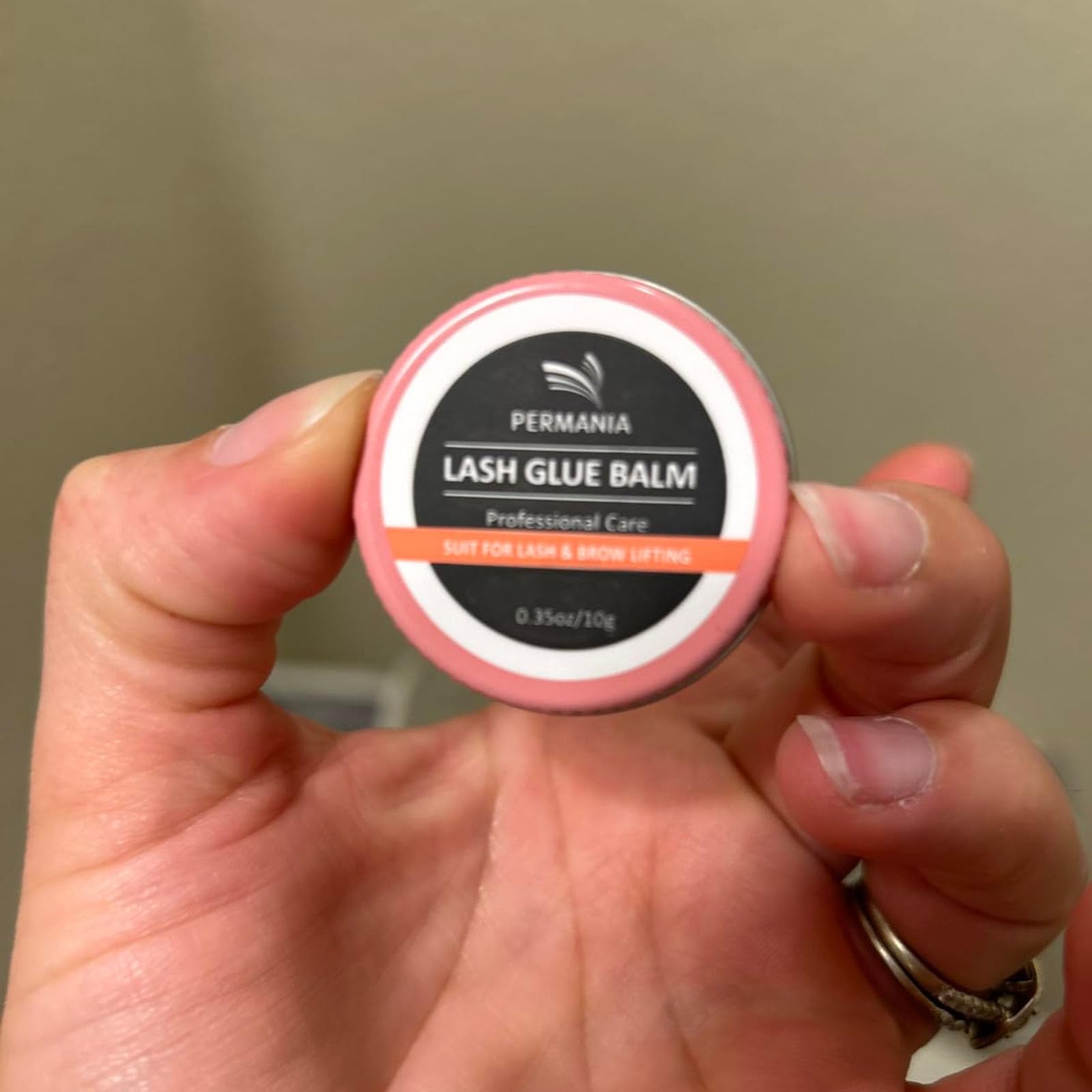 PERMANIA Lash Lift Balm Glue glass jar closeup emphasizes water-soluble formula for easy removal.